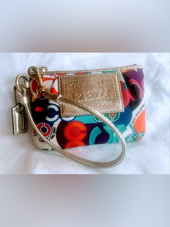 Coach Handbags - ❌ SOLD ❌Coach Multicolor Poppy Signature Wristlet with Gold Trim
